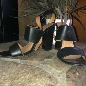 Black heeled sandals with ankle strap
